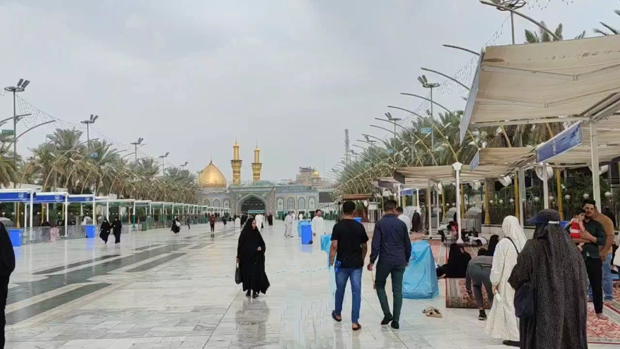 زیارت اماکن مقدس عراق در هوای بارانی + فیلم